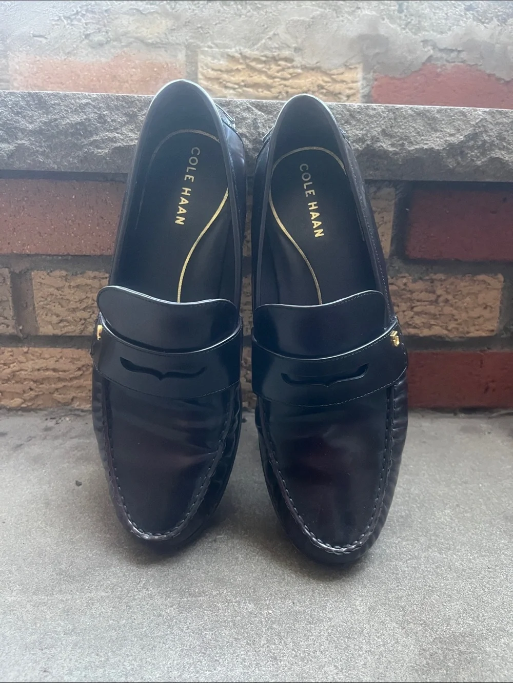 Cole Haan Women's Black Leather Penny Loafers with Gold Accents